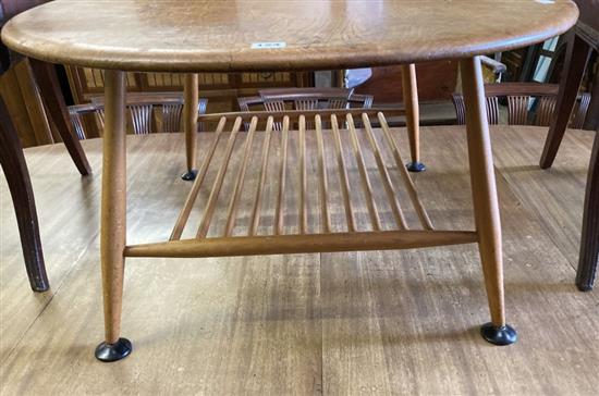 An Ercol light elm and beech oval coffee table, width 99cm, depth 82cm, height 45cm